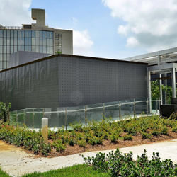 Commercial building exterior with glass and stainless steel accessibility railing